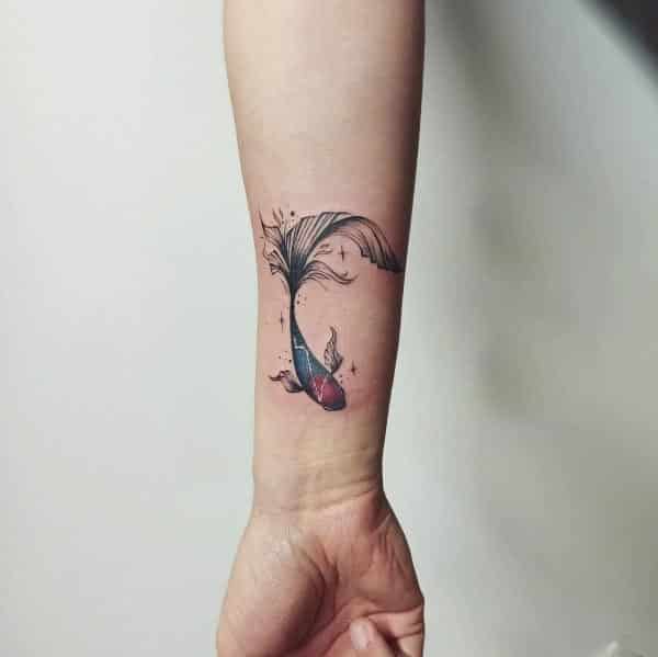 fish tattoo design on wrist