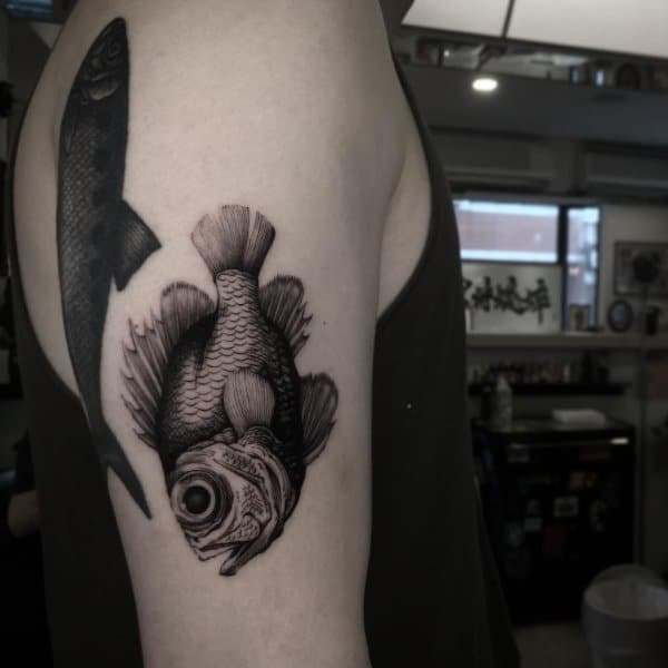 fish tattoos on arm