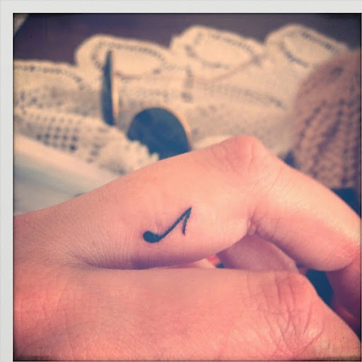 Small Tattoos small music note tattoo on finger