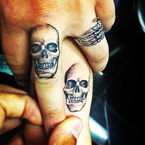skull Finger tattoos sugar skull finger tattoo