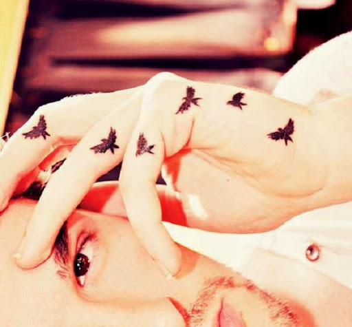 Small Tattoos small flying birds tattoos on fingers