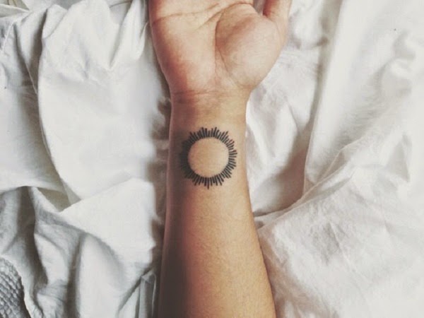 Small Tattoos small sun tattoo on wrist
