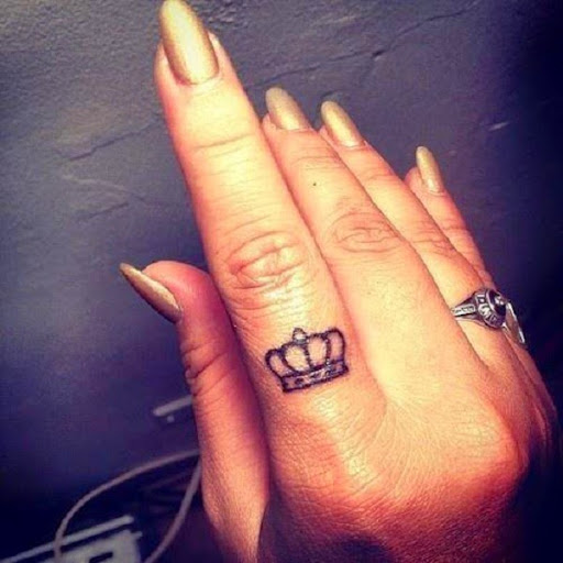 Small Tattoos small crown tattoos on finger