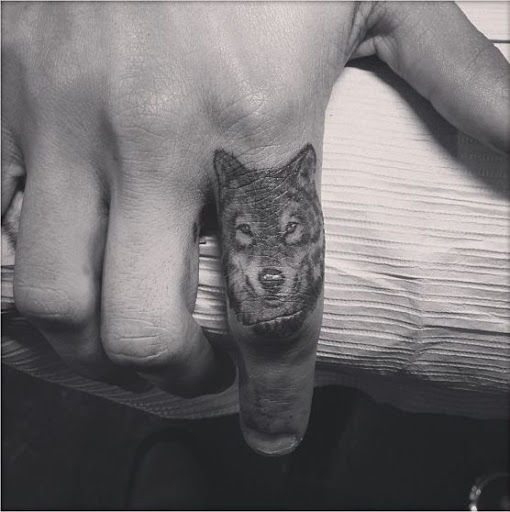 Finger tattoo wolf Finger tattoo