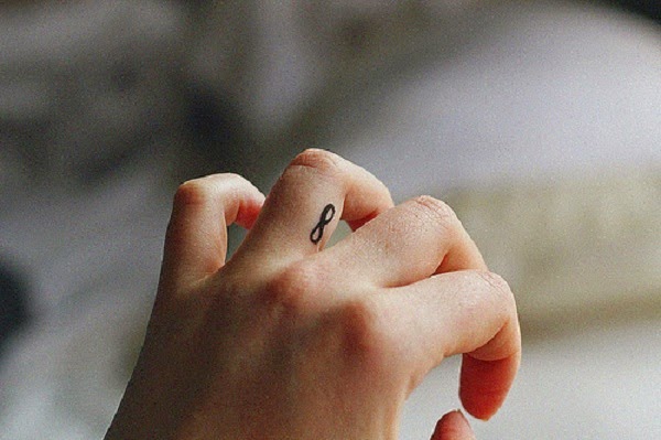 Small Tattoos small infinity tattoo on finger