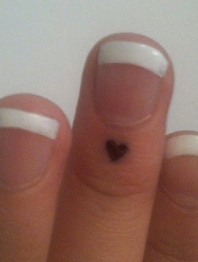 Small Tattoos small heart tattoo on finger