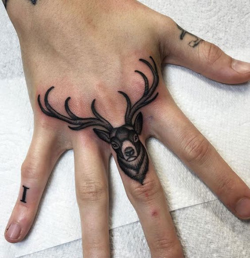 Finger tattoos reindeer finger tattoos