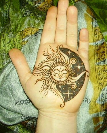 sun tattoos on hand