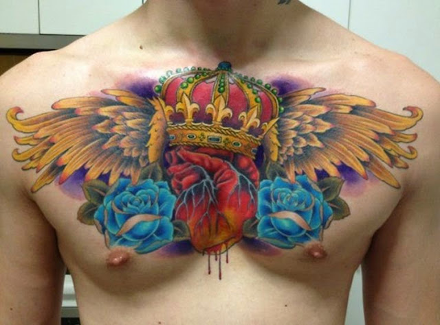 blue rose with wings and crown tattoos on chest 