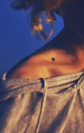 Small Tattoos small star tattoo on collar bone of women