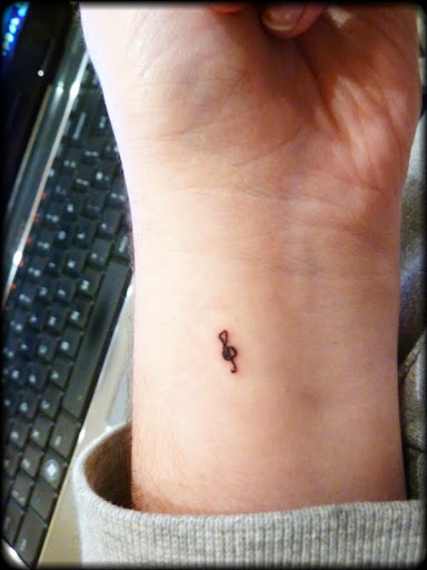 Small Tattoos small music symbol & tattoo on wrist