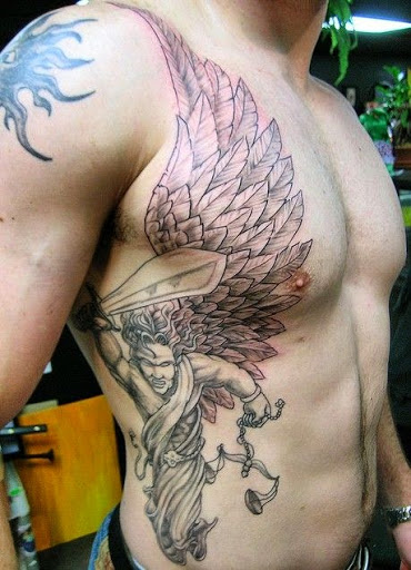 Angel tattoos angel tattoos on chest and side rib