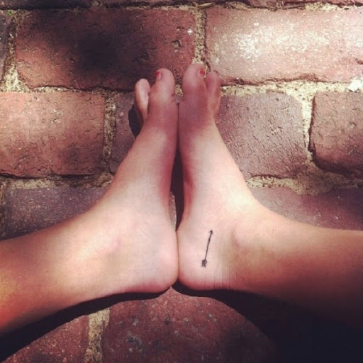 Small Tattoos small arrow tattoo design on foot women