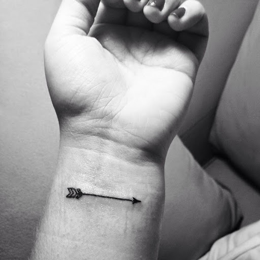 Small Tattoos arrow small tattoo on wrist