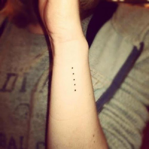 Small Tattoos small dot tattoo on side wrist