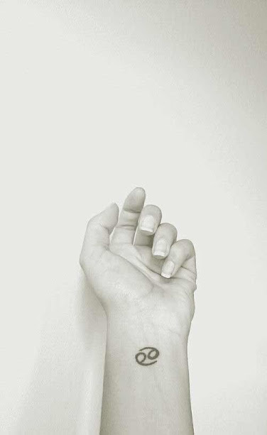 cancer zodiac tattoos design on wrist