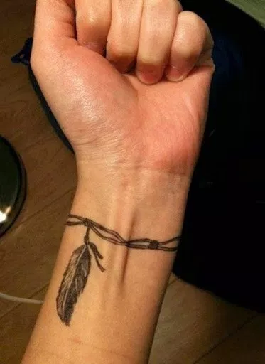 wrist tattoos feather wrist tattoo designs