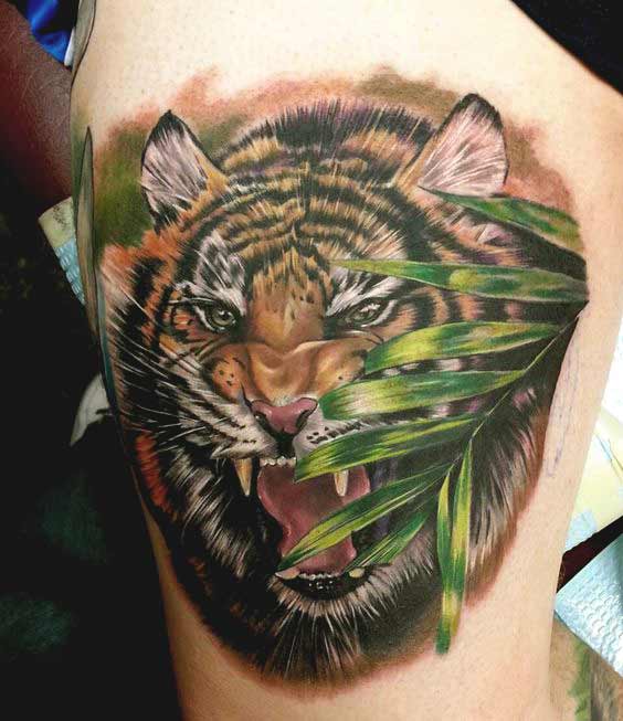 Tiger tattoo designs on thigh for girls