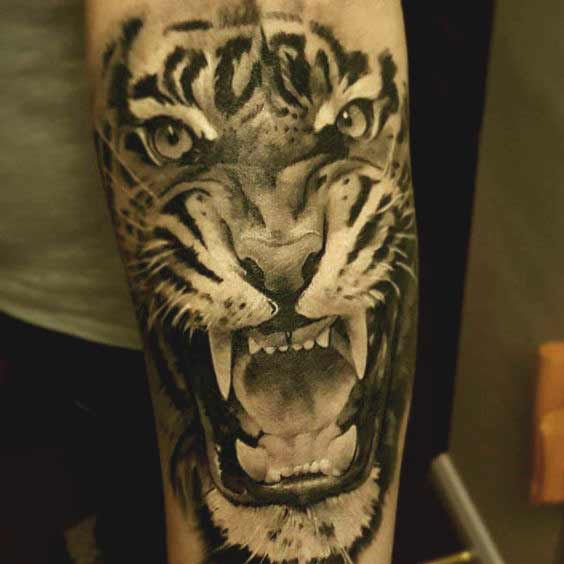 Tiger face tattoo on forearm designs for girls