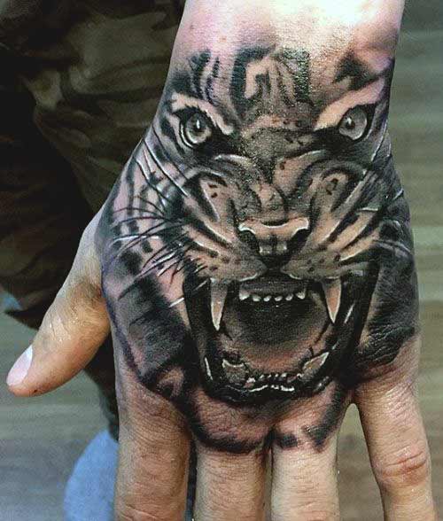 Tiger tattoo designs on hand for men and women