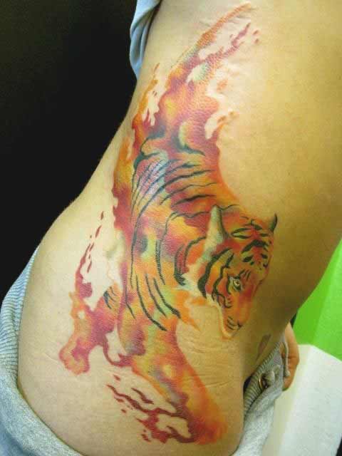 Watercolor tiger tattoo on ribs ideas for girls