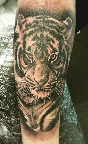 Tiger tattoo on hand ideas for men and women