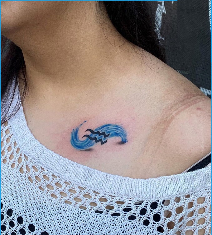 aquarius tattoo design on collar bone