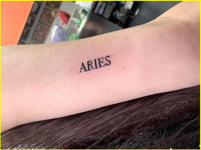 aries letter tattoo
