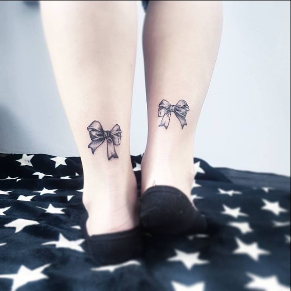 bow matching tattoos on ankle