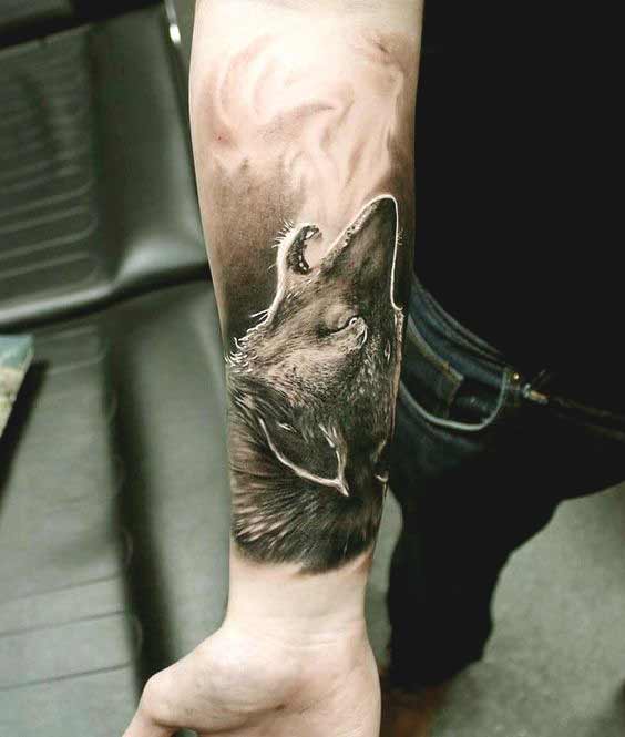 Wolf inner forearm tattoo