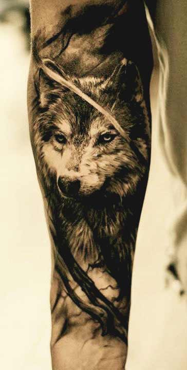Wolf outer forearm tattoos