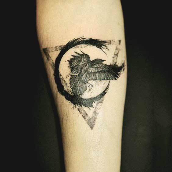 beautiful raven tattoo design for forearm