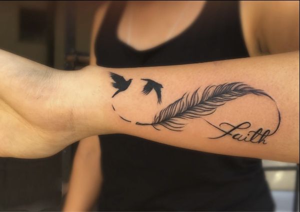 Tattoo uploaded by Vipul Chaudhary  Infinity tattoo Infinity with feather  tattoo Tattoo for girls Girls tattoo  Tattoodo