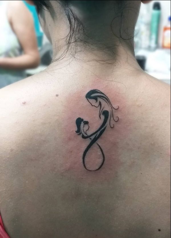 INFINITY WITH FOOTPR  CRAZY INK TATTOO  BODY PIERCING SURAT in Surat  India