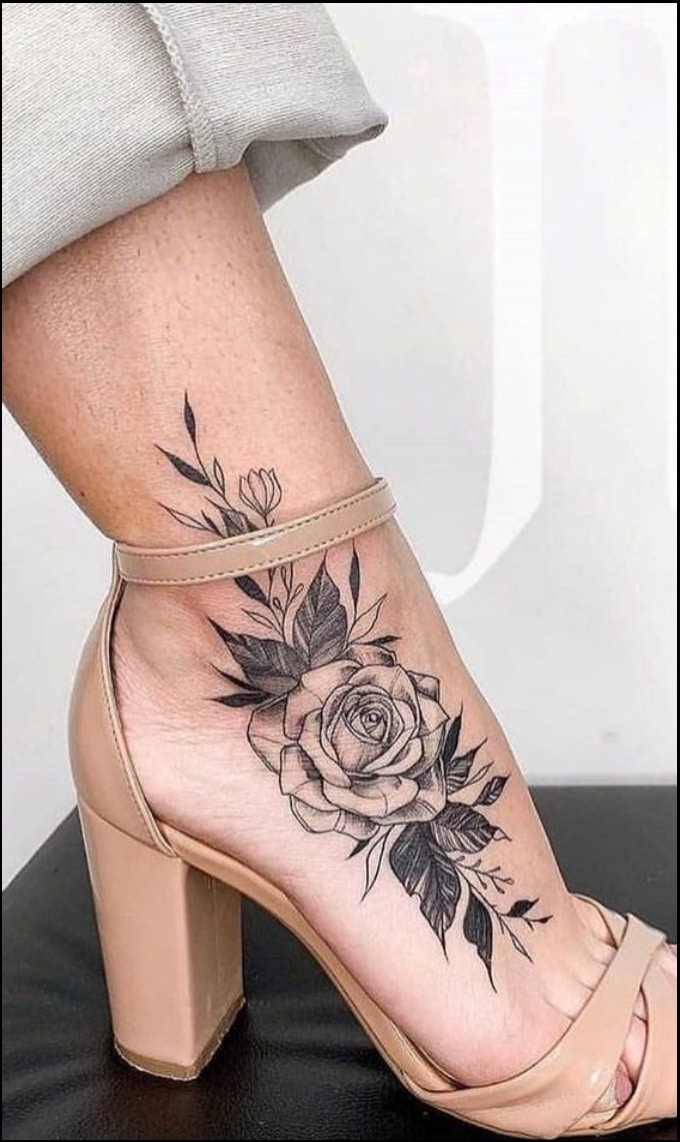 Realistic Grey Rose Flower Tattoo On Left Foot