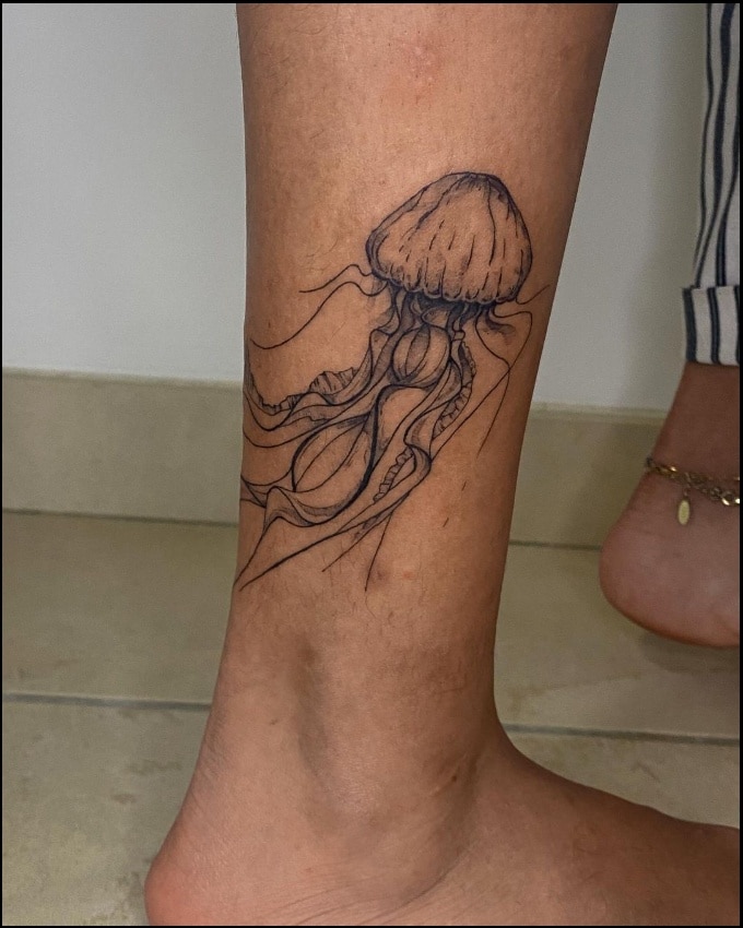 Jellyfish tattoos on ankle