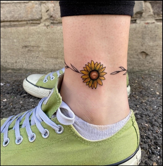 Sunflower tattoo on the ankle