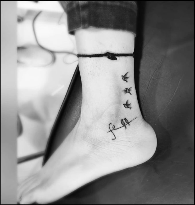 small birds ankle tattoos