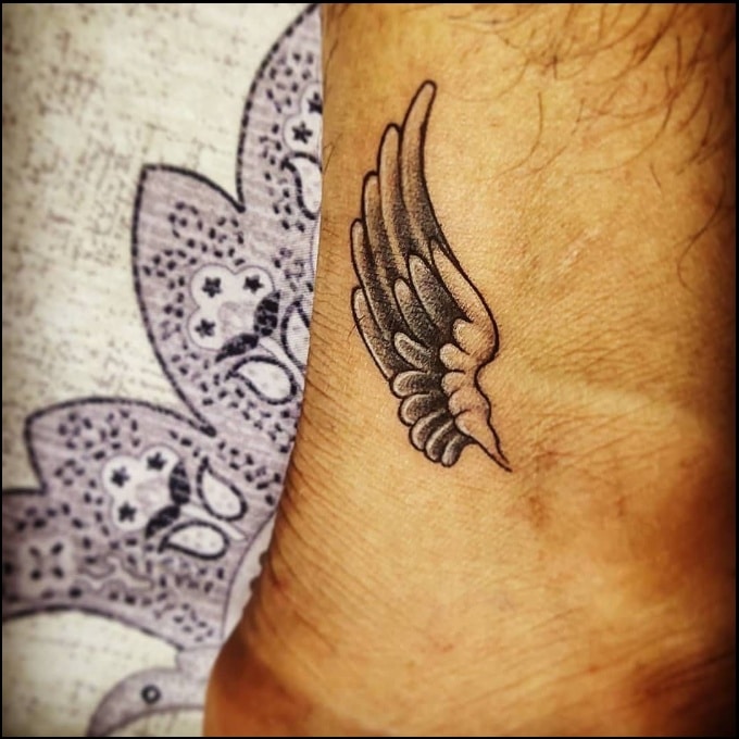 wings ankle tattoos