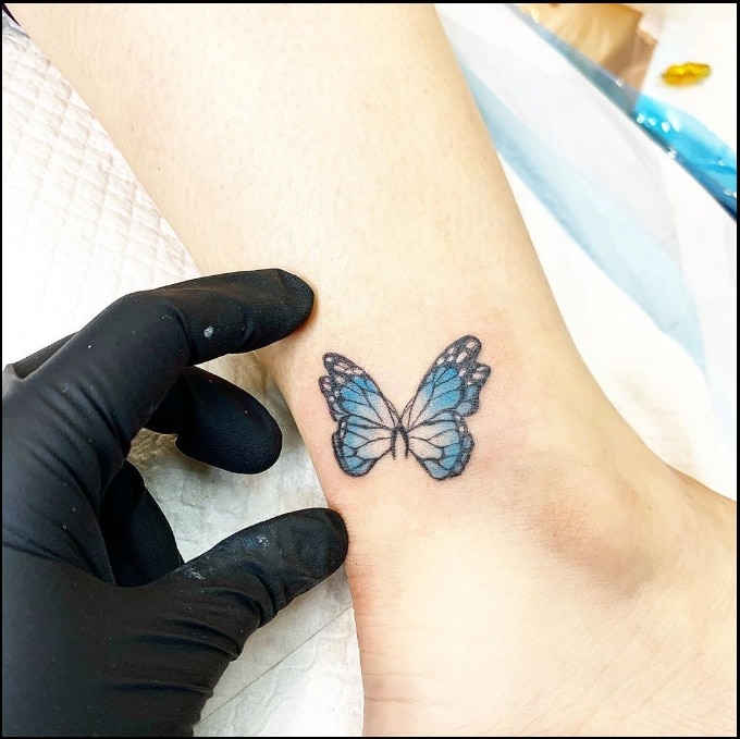 small butterfly ankle tattoos