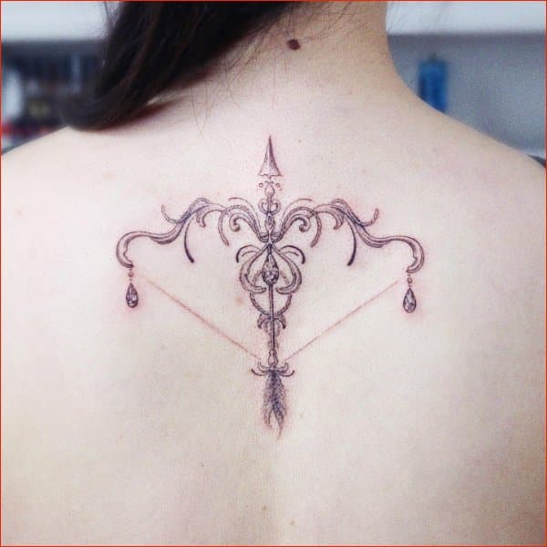 Best arrow tattoos on back for women