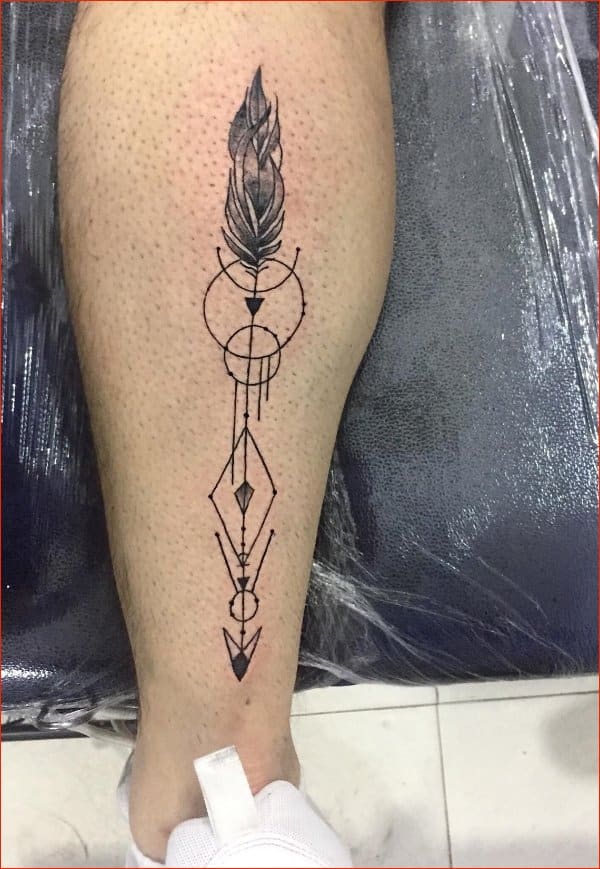 geometrical style arrow tattoos