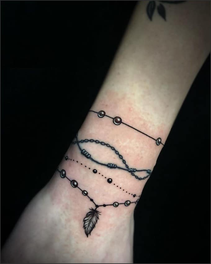 Flower bracelet tattoos