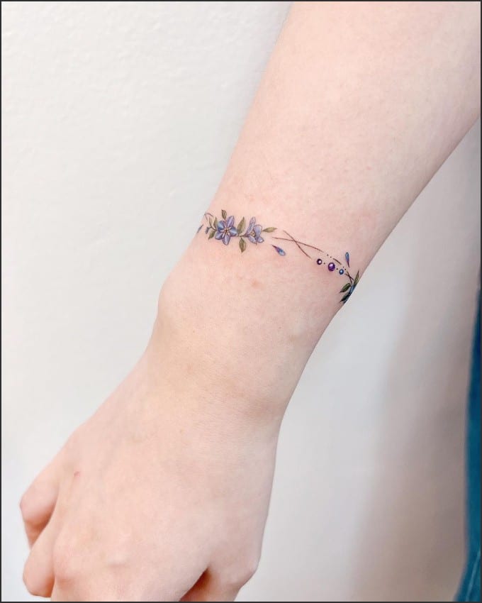Flower bracelet tattoos