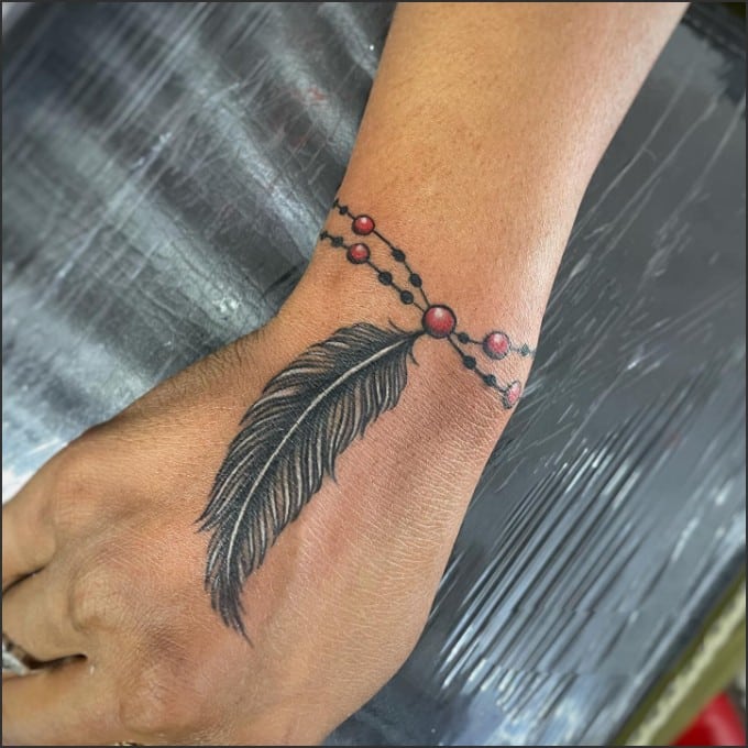 feather bracelet tattoos