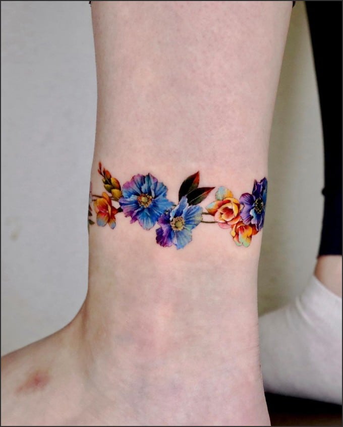 Gorgeous floral tattoo on the inner wrist - Tattoogrid.net