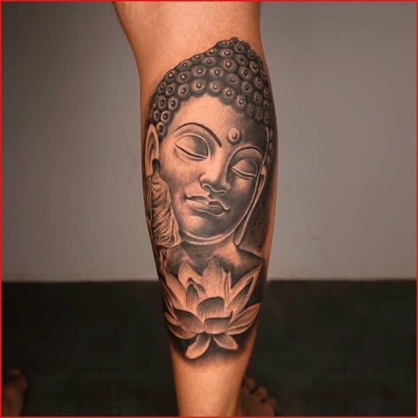 Buddha with lotus arm tattoos