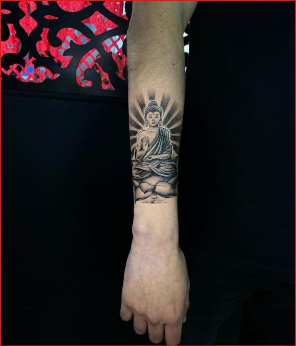 Buddha and skull tattoos with lotus