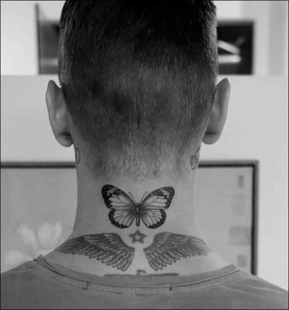 butterfly tattoos on side of neck