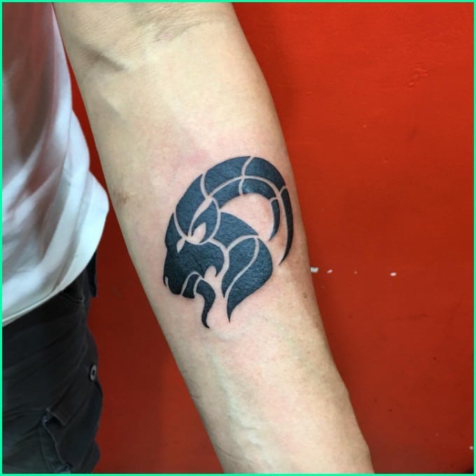 tribal capricorn tattoo